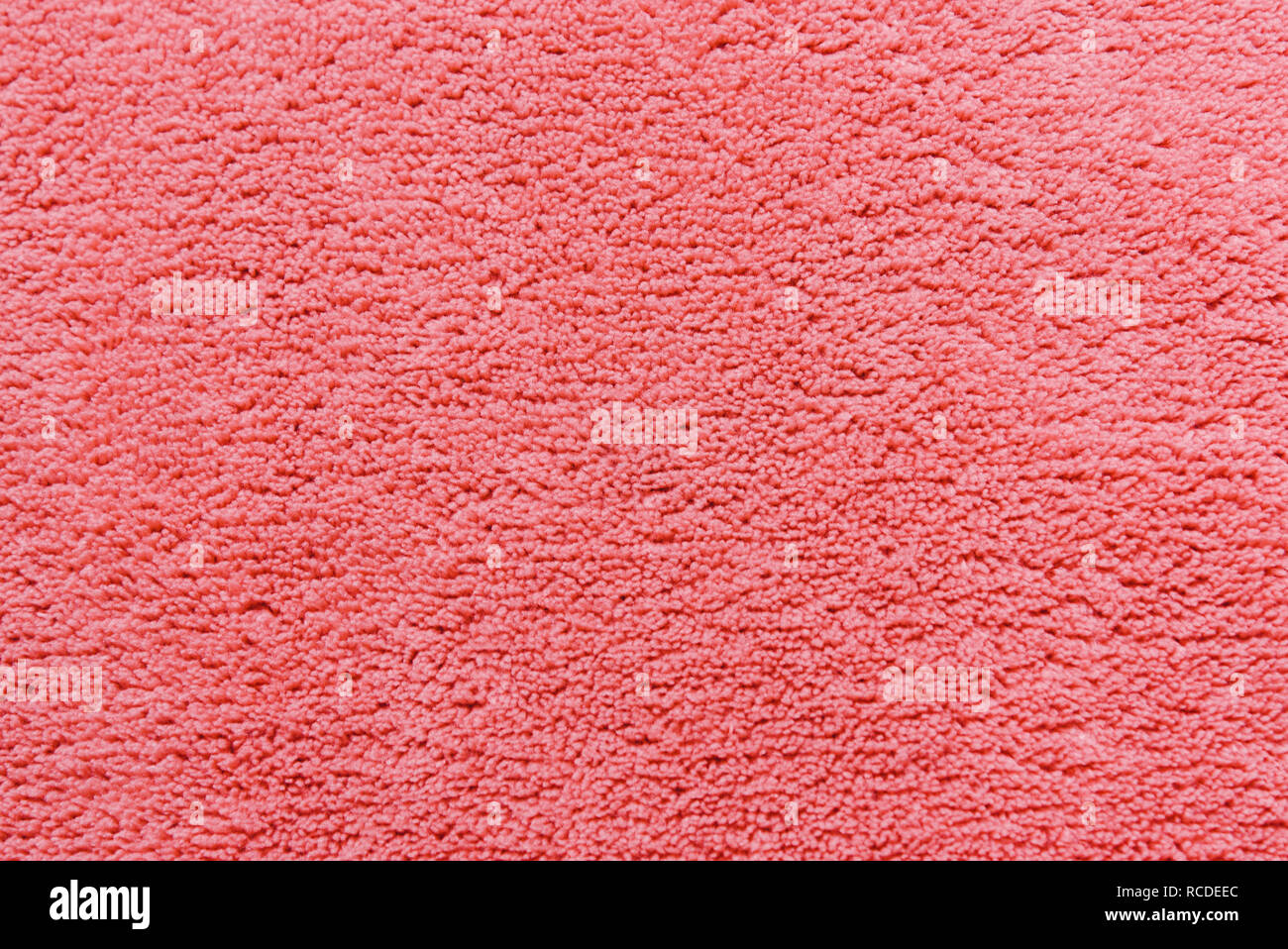 Coral soft Fleece Textur. Die Oberfläche einer Teddy mikrofaser Teppich Stockfoto