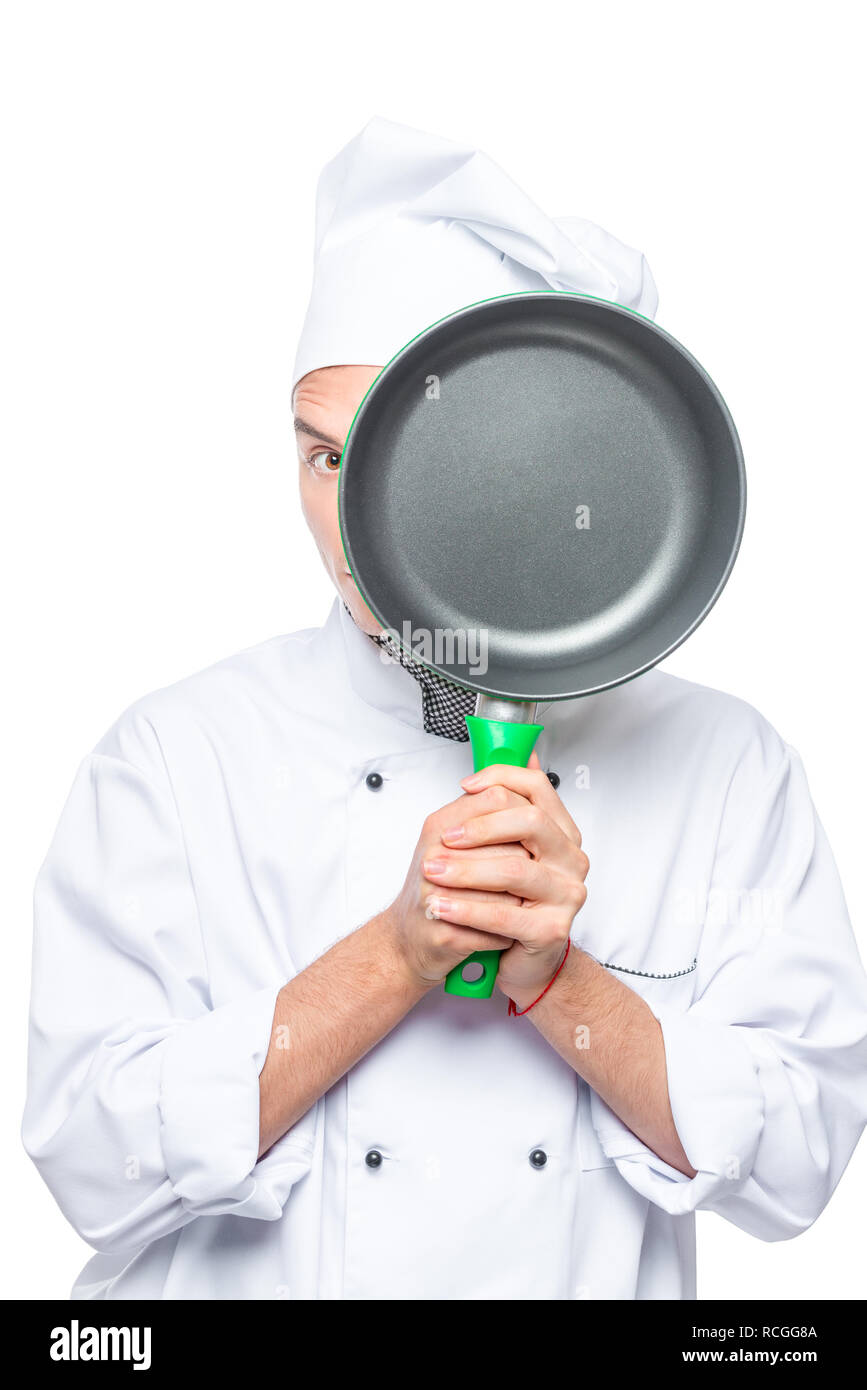 Koch sieht hinter der Pan, das Porträt ist isoliert Stockfoto