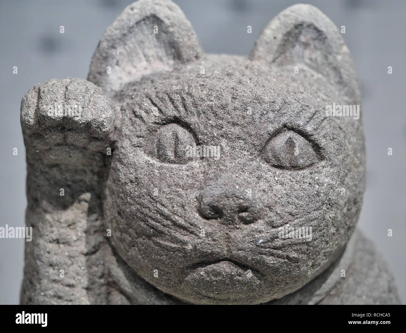 20. Jahrhundert Stein Maneki Neko Stockfoto