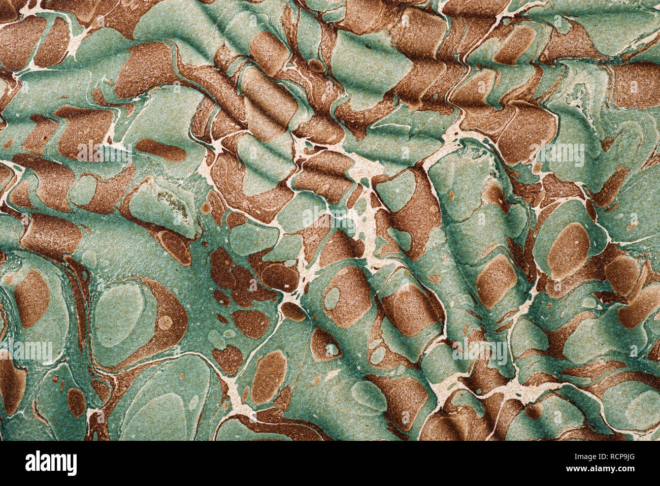 Vintage Braun und Blau marmoriertem Papier Hintergrund Textur aus einem antiken Buch endpaper Stockfoto