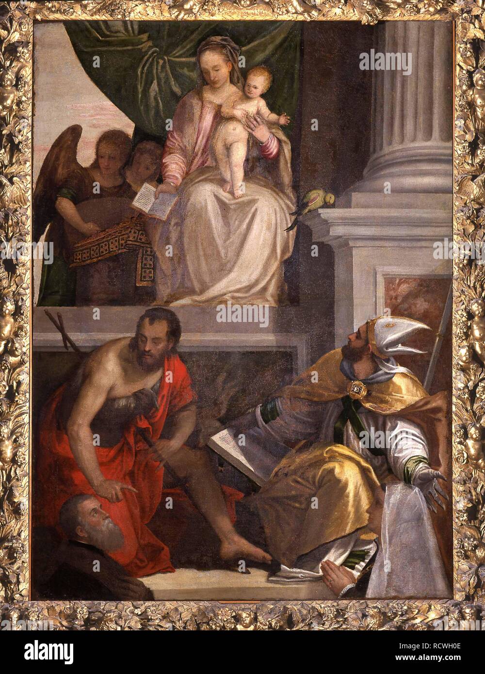 Thronende Madonna mit Kind, der hl. Johannes der Täufer, St. Louis von Toulouse und Spendern. Museum: Museo di Castelvecchio, Verona. Autor: Veronese, Paolo. Stockfoto