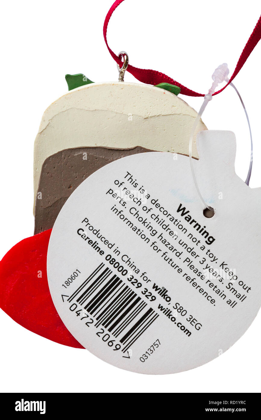 Warnhinweise auf Tag Label von hängenden Weihnachten Dekoration auf weißem Hintergrund Stockfoto