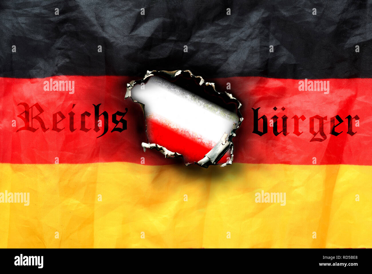 Deutschland Fahne mit Feuer Loch und Imperial Flag, Bewegung ist symbolisch Foto imperial Citizen, Deutschlandfahne mit Brandloch und Reichsflagge, Symbolfoto Stockfoto