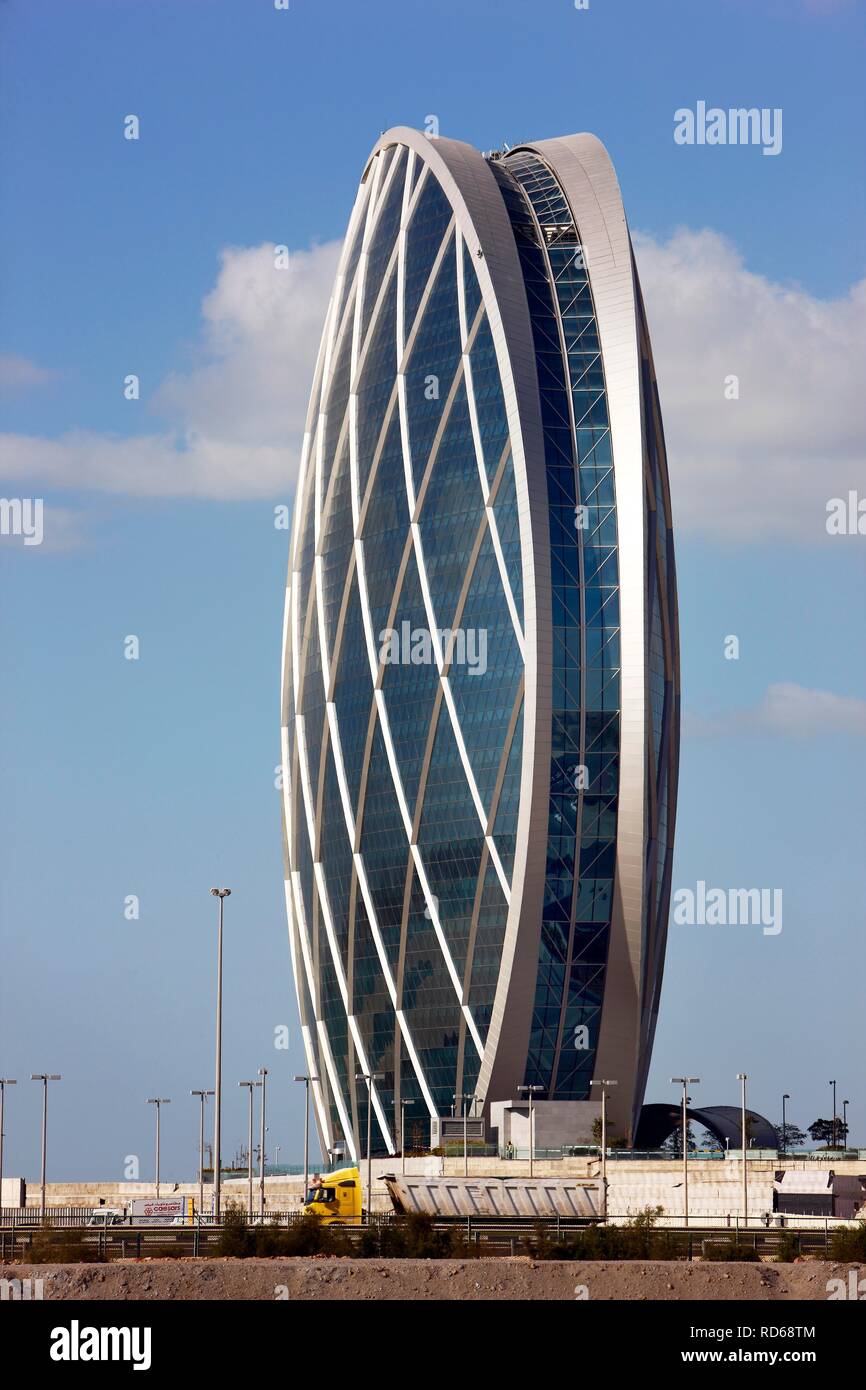 Die Münze Gebäude, Aldar Sitz der Gesellschaft, eine der größten Immobiliengesellschaften in der Arabischen Welt, Abu Dhabi Stockfoto