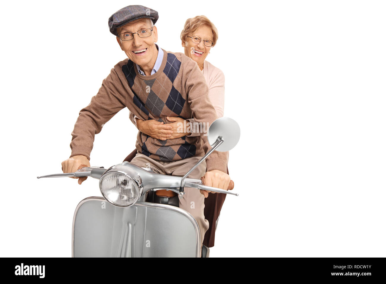 Senior glückliches Paar, ein Vintage Motorrad auf weißem Hintergrund Stockfoto