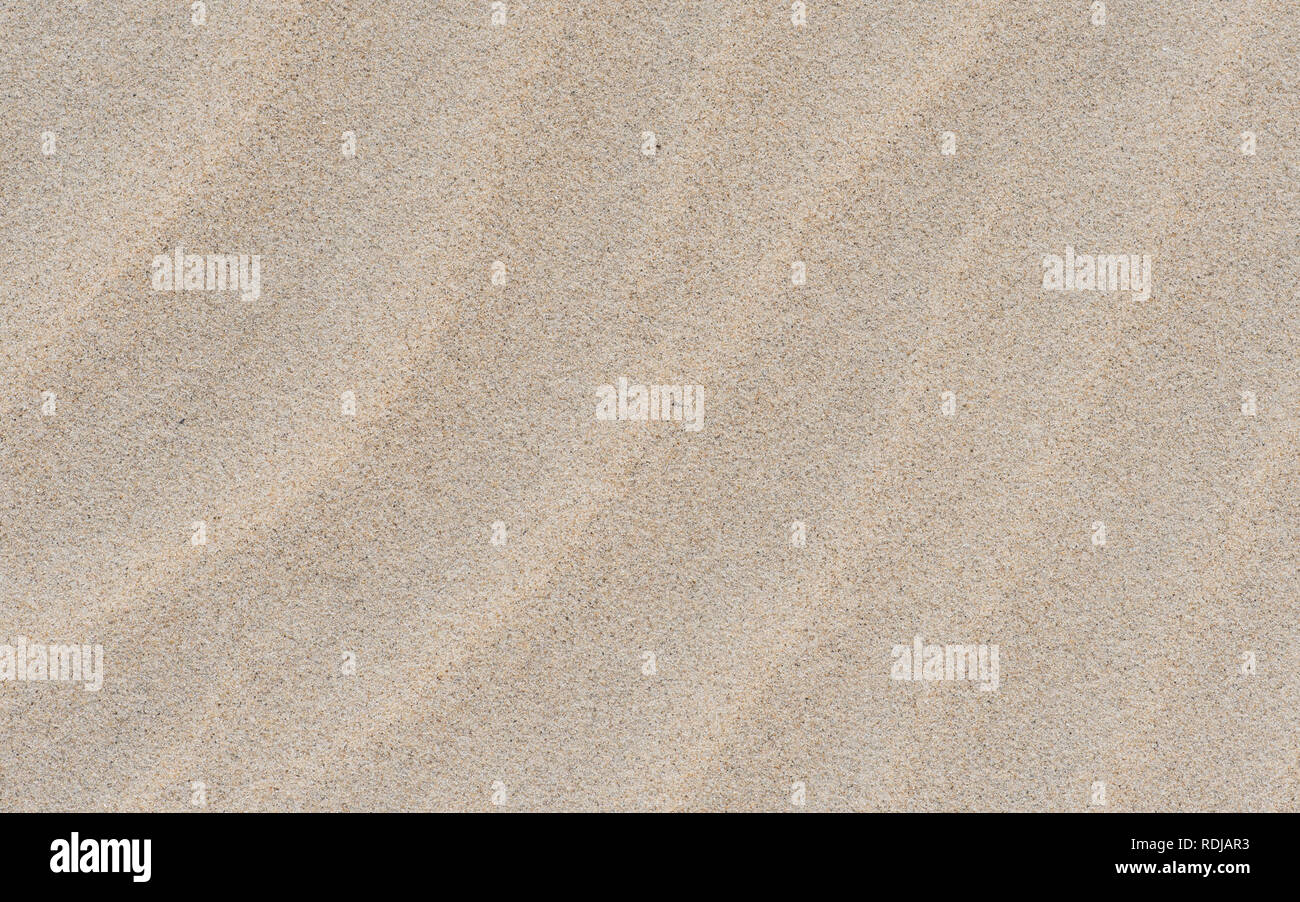 Welligkeit auf dem Sand. Natur creme Hintergrund. Sand von Danang My-Khe-Strand, Vietnam. Stockfoto Welligkeit auf dem Sand. Natur creme Hintergrund. Sand von Danang My-Khe-Strand, Vietnam. Stockfoto