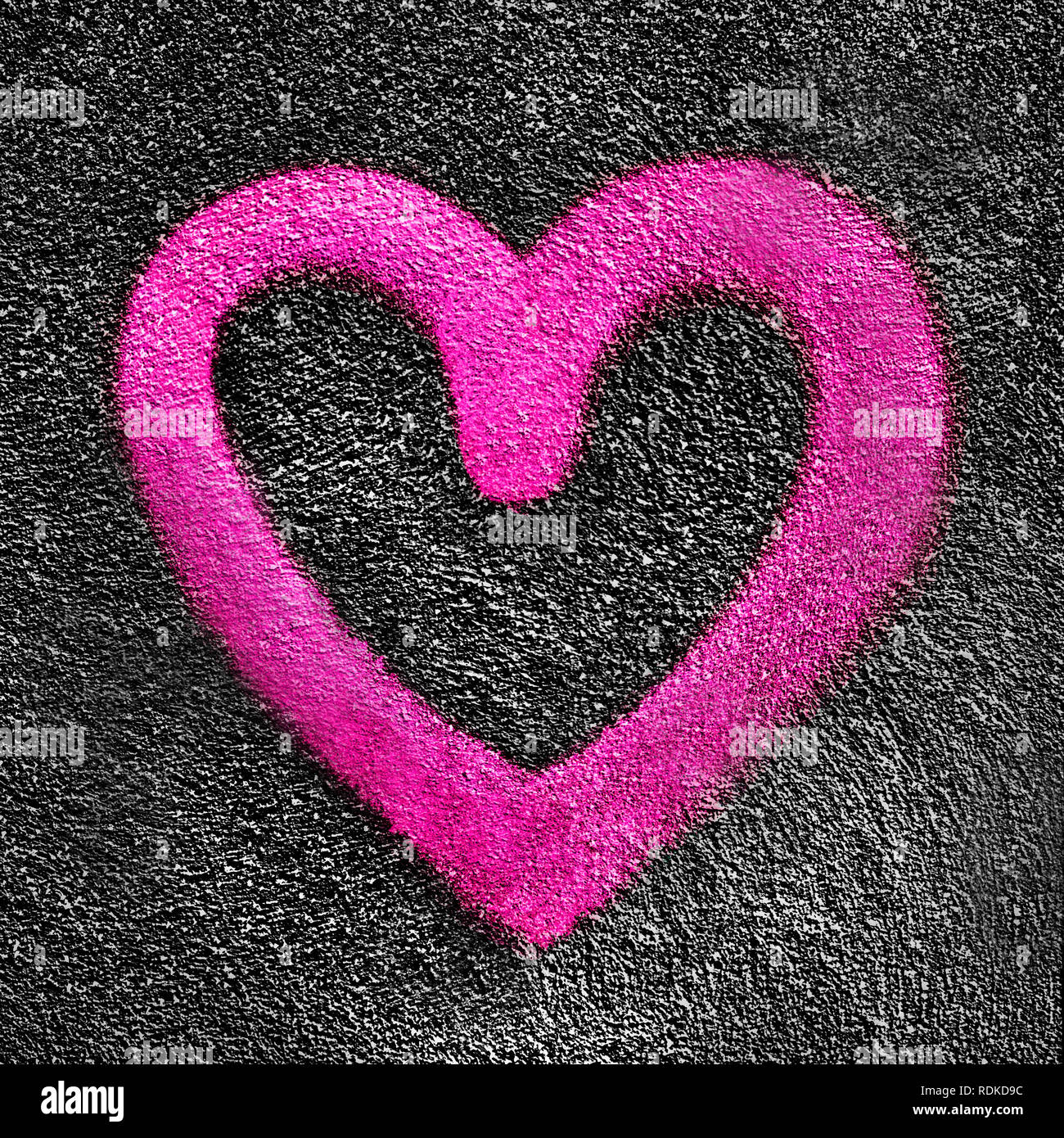 Rosa Herzen auf Asphalt. Geeignet für Liebe und Valentinstag Konzepte. Stockfoto