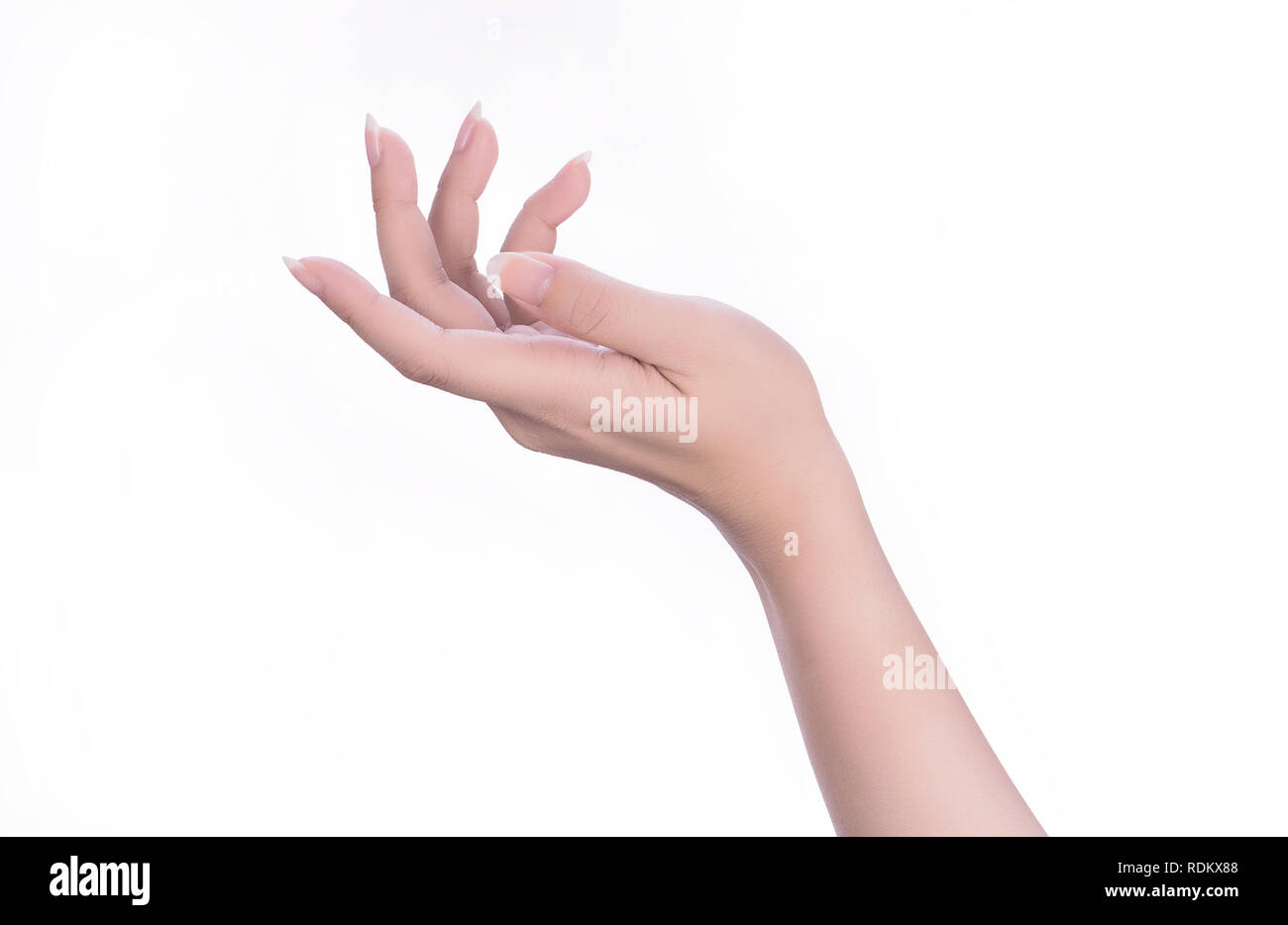 Schöne Frau die Hände auf weißem Hintergrund, Konzept, eine virtuelle Sache oder die Hand Maniküre Pflege, Nahaufnahme. Stockfoto