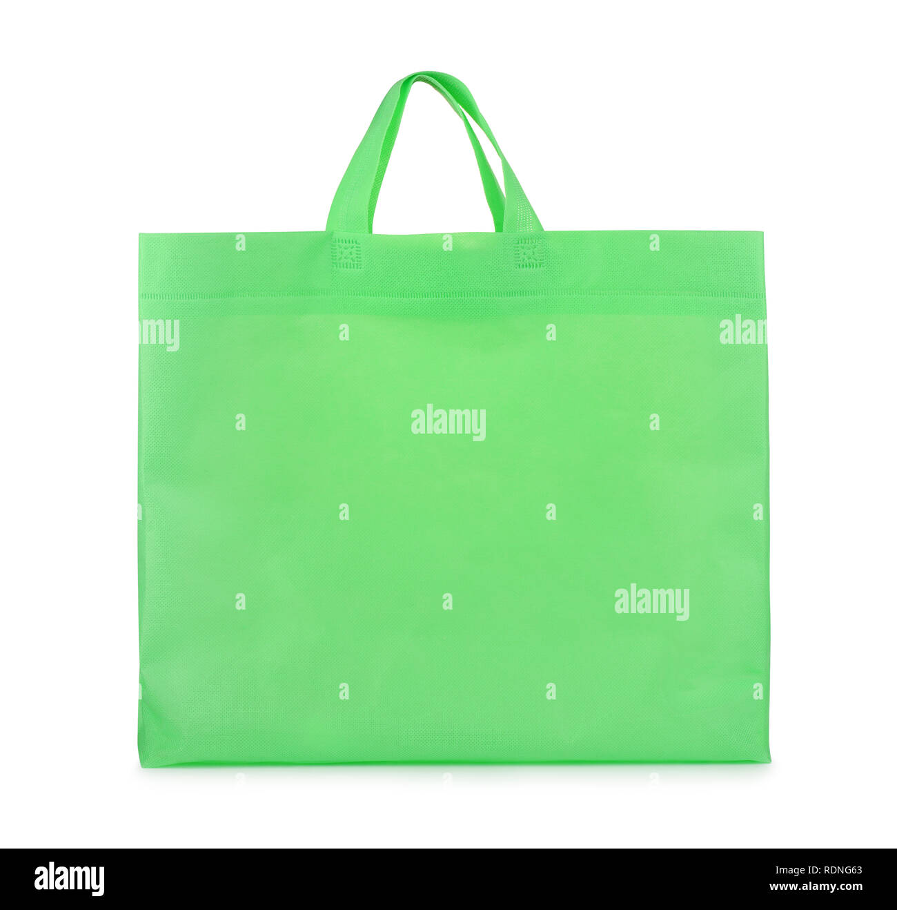 Grünem Stoff leere Einkaufstasche isoliert auf weißem Stockfoto