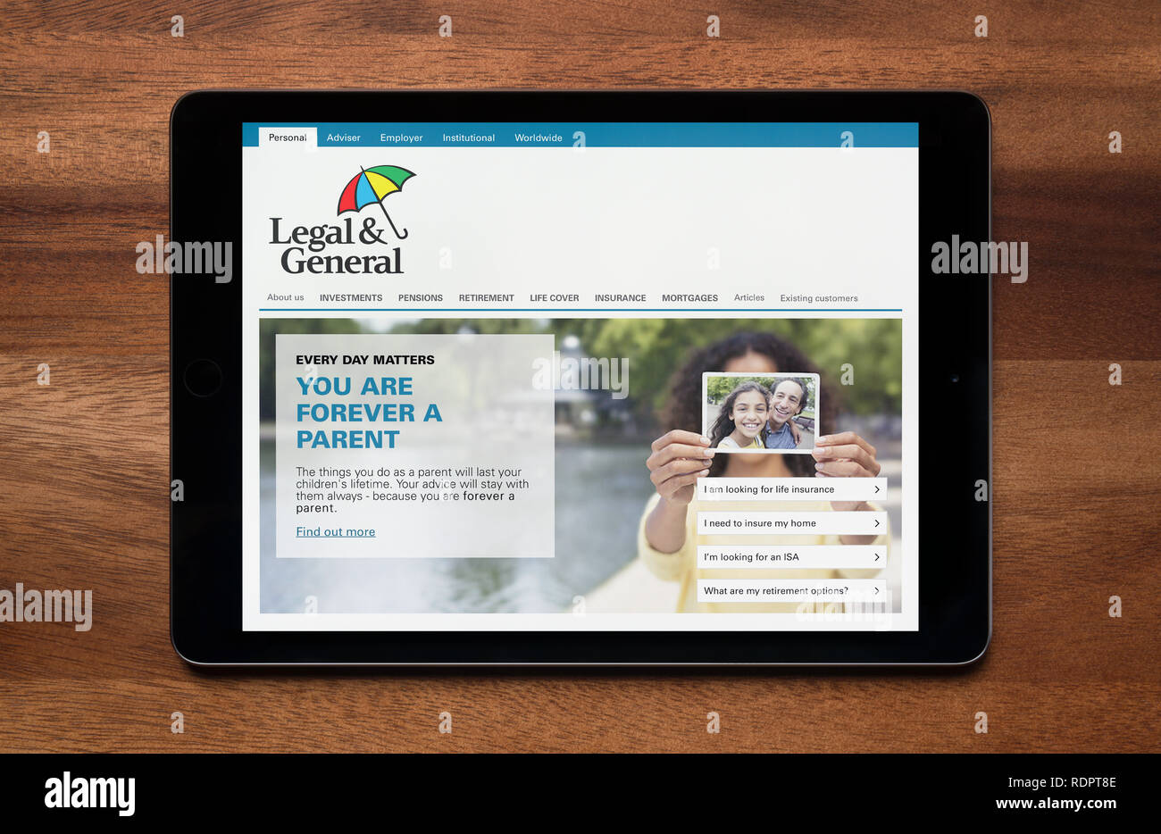Die Website von rechtlichen und allgemein gesehen auf einem iPad Tablet, der ruht auf einem Holztisch (nur redaktionelle Nutzung). Stockfoto