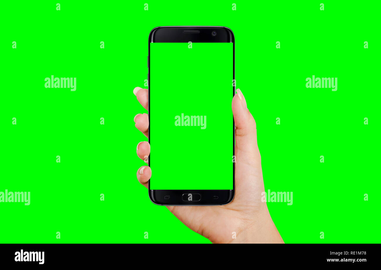 Schwarz, Smart Phone in der Frau die Hand. Isolierte Bildschirm und Hintergrund in grün, Chroma Key. Stockfoto