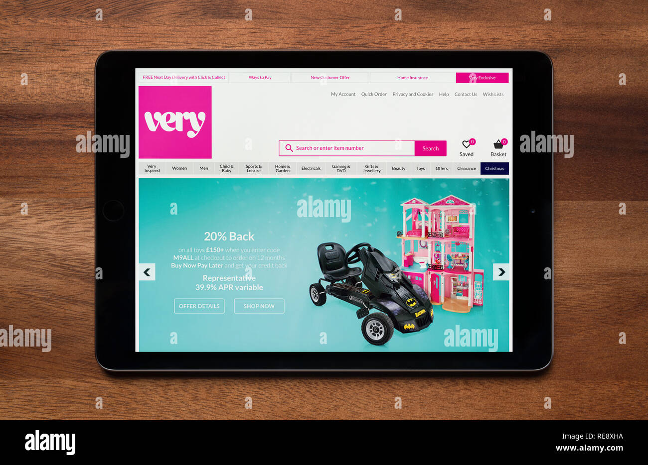Die Website von Sehr.co.uk ist gesehen auf einem iPad Tablet, der ruht auf einem Holztisch (nur redaktionelle Nutzung). Stockfoto