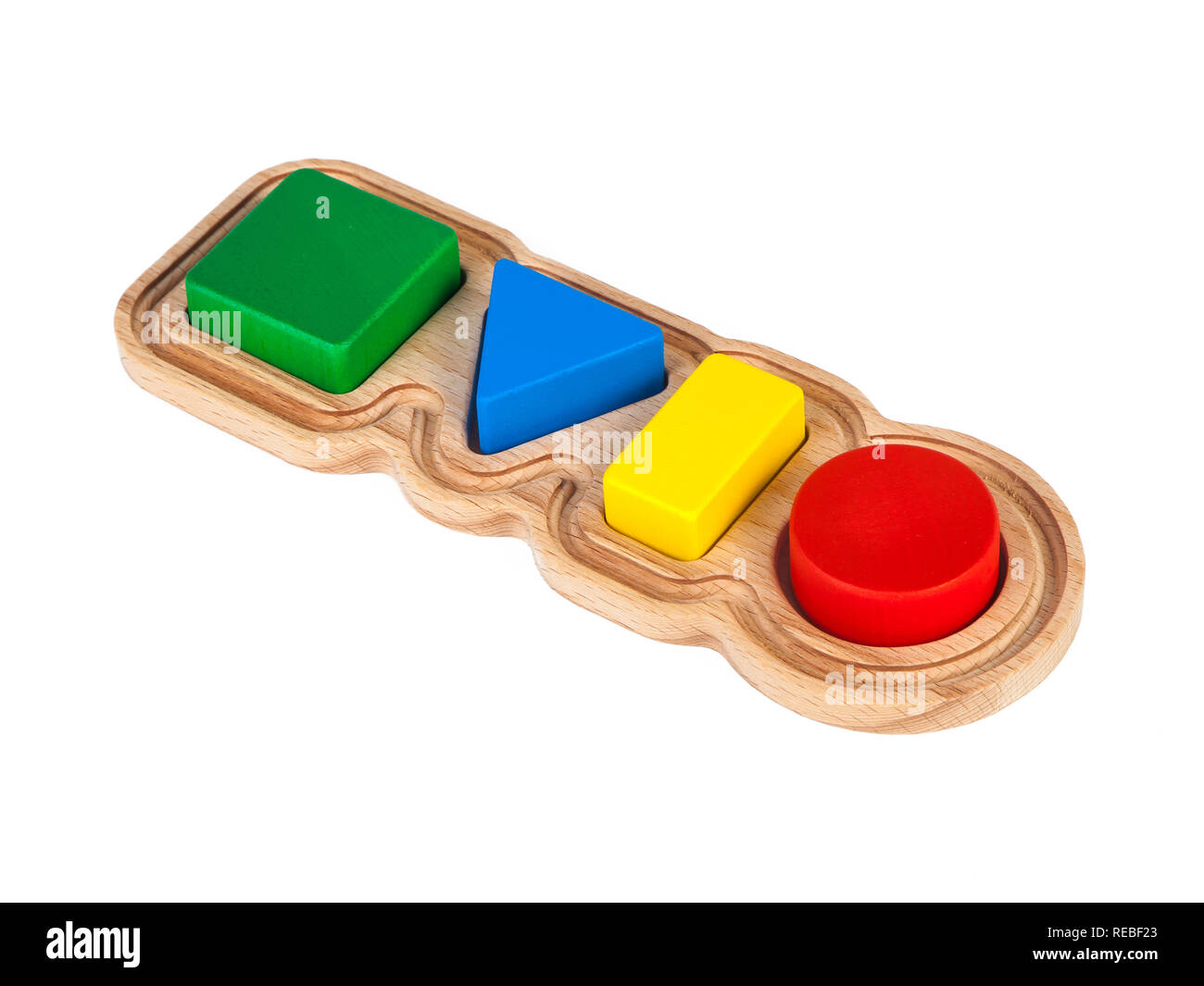 Foto eines Holzspielzeug Kinder Sorter mit kleinen Details in Form von geometrischen Formen (Rechteck, Quadrat, Kreis, Dreieck), in verschiedenen Stockfoto