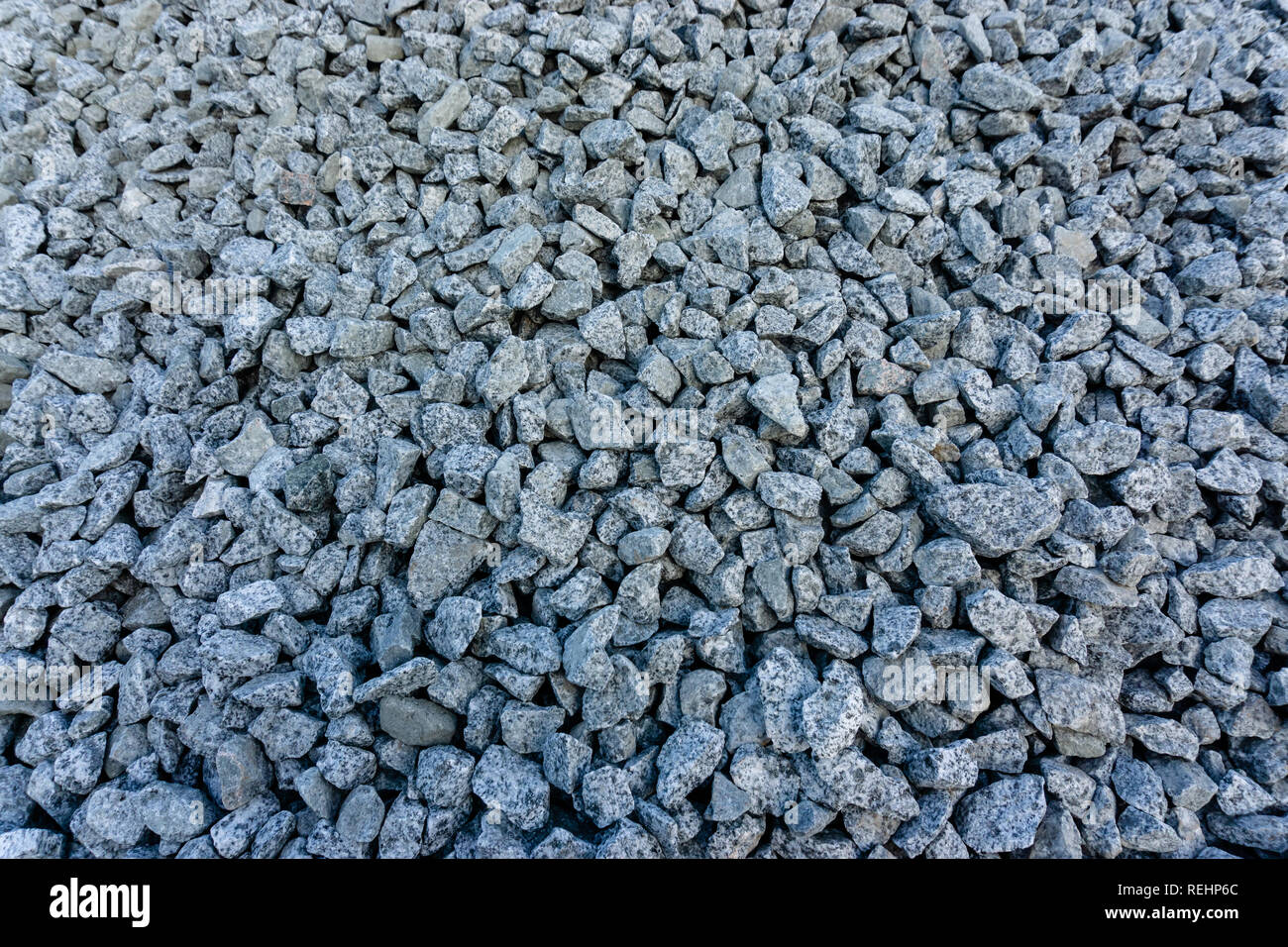 Graue Masse Stein Schutt Hintergrund der vielen kleinen Steine Stockfoto