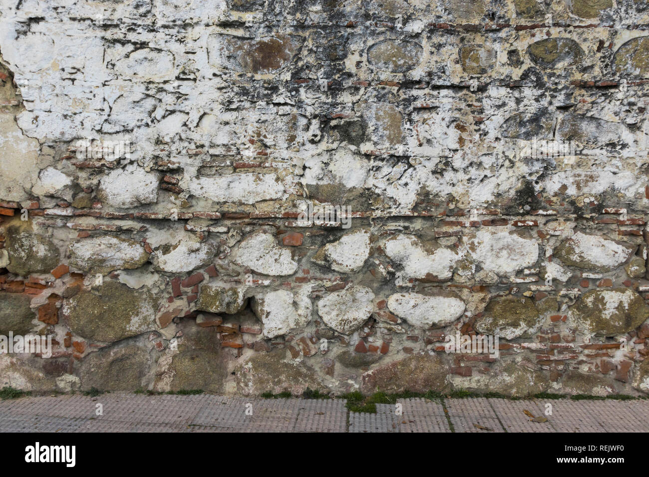 Alte Mauer aus Stein und Backstein für den Hintergrund Ihrer Fotos, Vintage Style Stockfoto