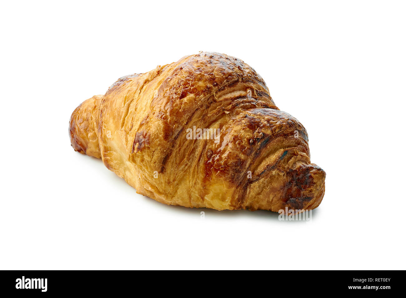 Single frische knusprige Croissants auf weißem Hintergrund Stockfoto
