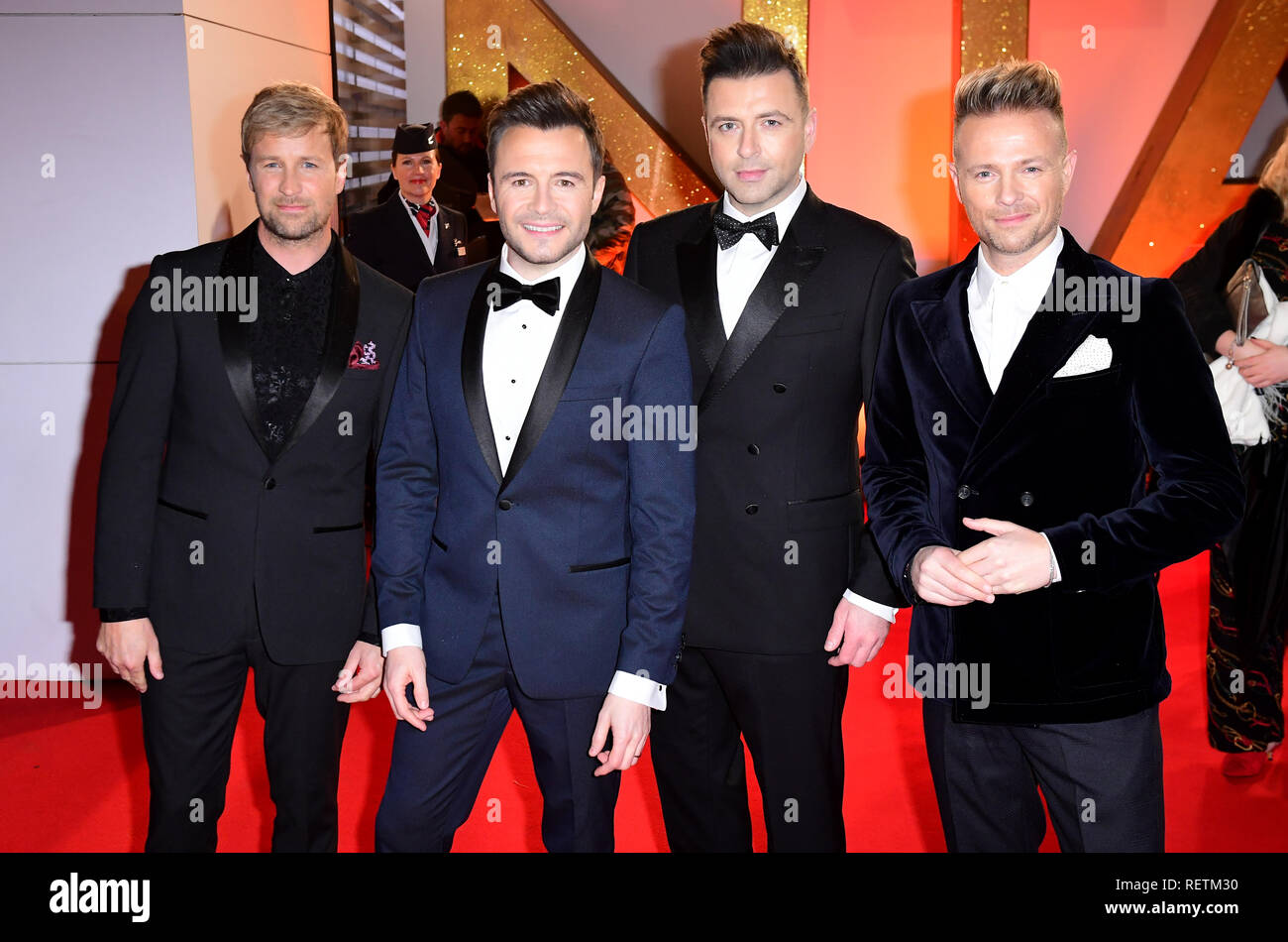 (Von links nach rechts) Kian Egan, Shane Filan, Mark Feehily und Nicky Byrne von Westlife die Teilnahme an der National Television Awards 2019 in der O2 Arena in London statt. Stockfoto