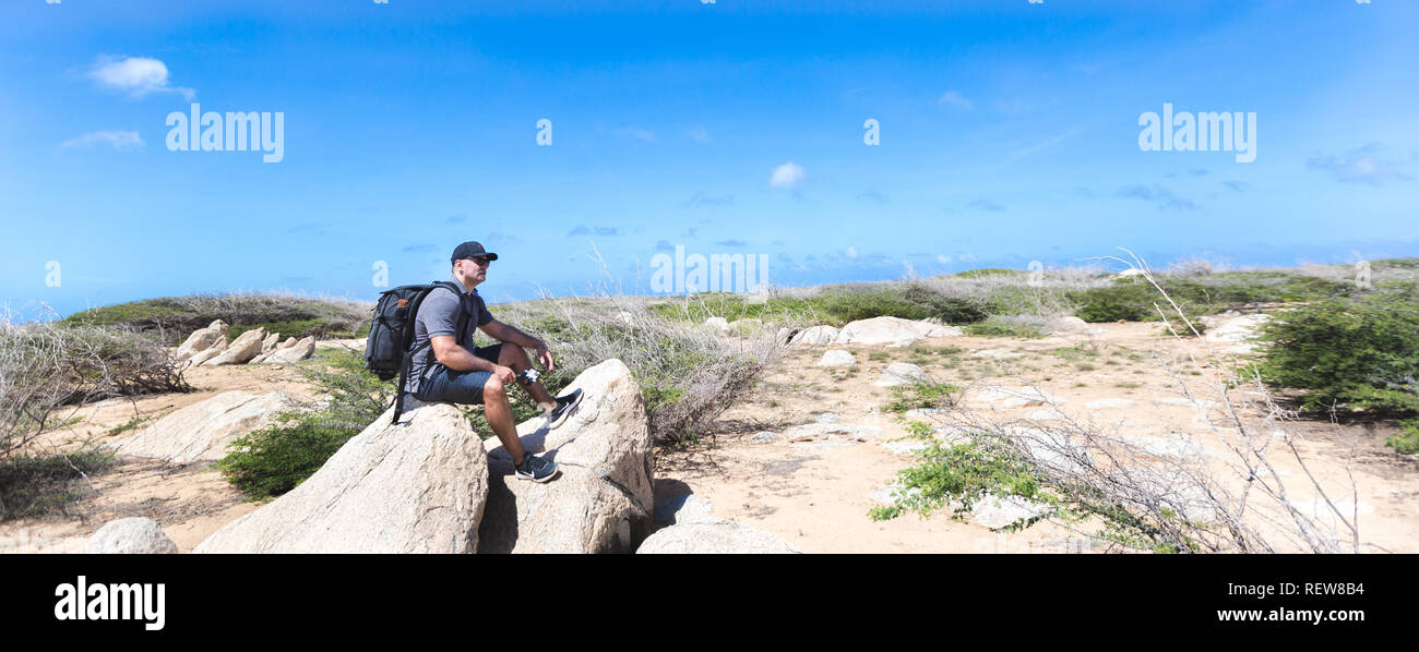 Junge zurück Fotograf erkunden Insel Aruba Happy Island Stockfoto