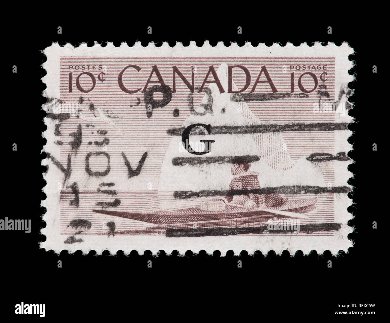 Briefmarke aus Kanada, ein Eskimo mit einem Kajak, mit 'G' für die offizielle Regierung verwenden überdruckt. Stockfoto