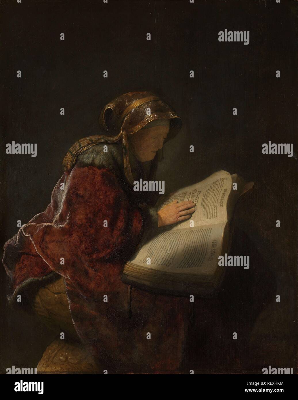 Eine alte Frau lesen, wahrscheinlich der Prophetin Hanna. Dating: 1631. Maße: H 60 cm x W 48 cm. Museum: Rijksmuseum, Amsterdam. Thema: Rembrandt van Rijn (auf Objekt erwähnt). REMBRANDT HARMENSZOON VAN RIJN. Rembrandt van Rhijn. Stockfoto
