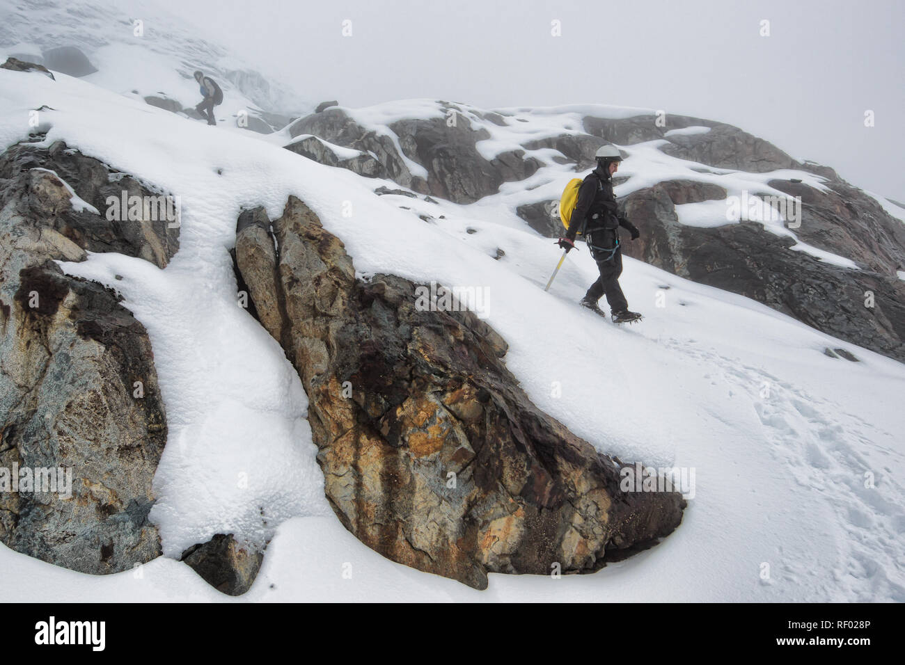 Am 6. Tag der Kilembe Route, Rwenzori Nationalpark, Wanderer versuchen, Gipfel Mount Stanley, dessen vergletscherten Margherita Peak in Uganda ist der höchste Punkt Stockfoto