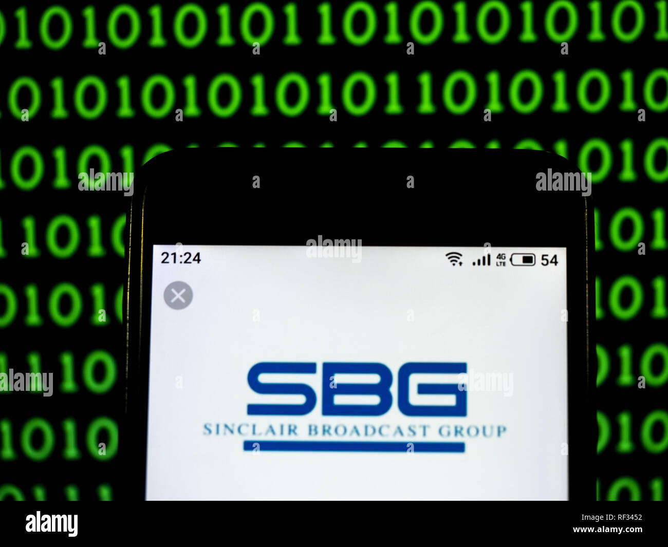 Kiew, Ukraine. 23 Jan, 2019. Sinclair Broadcast Group Telekommunikation Firmenlogo gesehen auf einem Smartphone angezeigt. Quelle: Igor Golovniov/SOPA Images/ZUMA Draht/Alamy leben Nachrichten Stockfoto