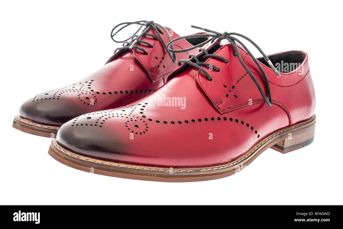 Ein Paar rote Flügel Kleidung Schuhe auf einem isolierten Hintergrund Stockfoto