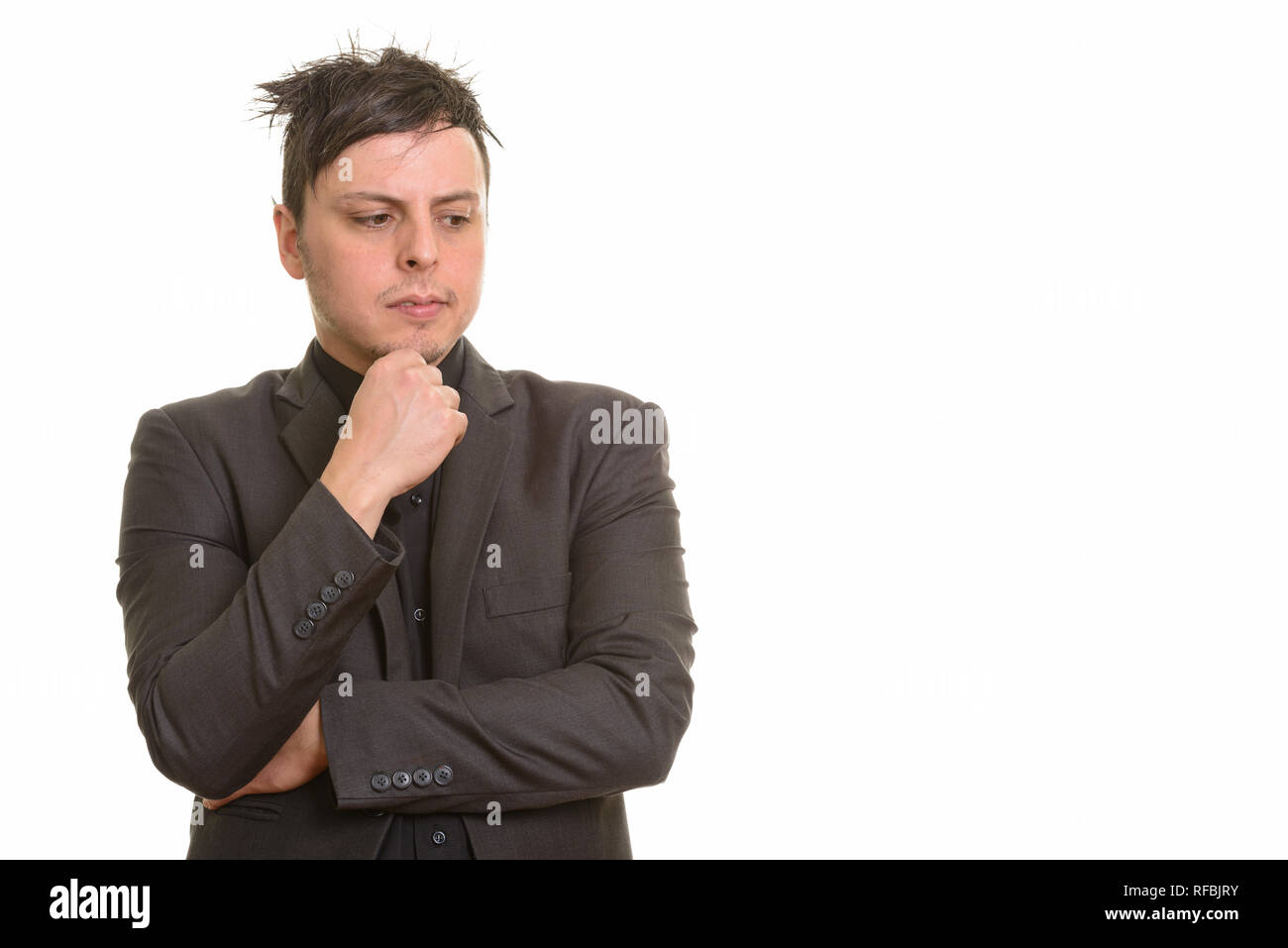 Studio shot der kaukasischen Geschäftsmann Denken gegen weißem Hintergrund Stockfoto