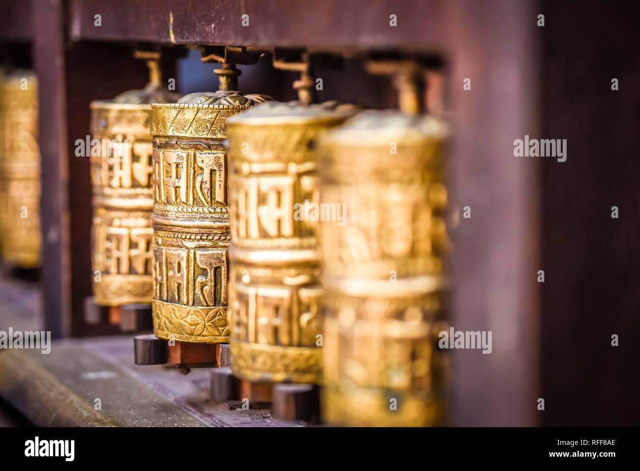 Buddhistische Gebetsmühlen, Golden Temple, Patan, Kathmandu Tal, Himalaya, Nepal Stockfoto