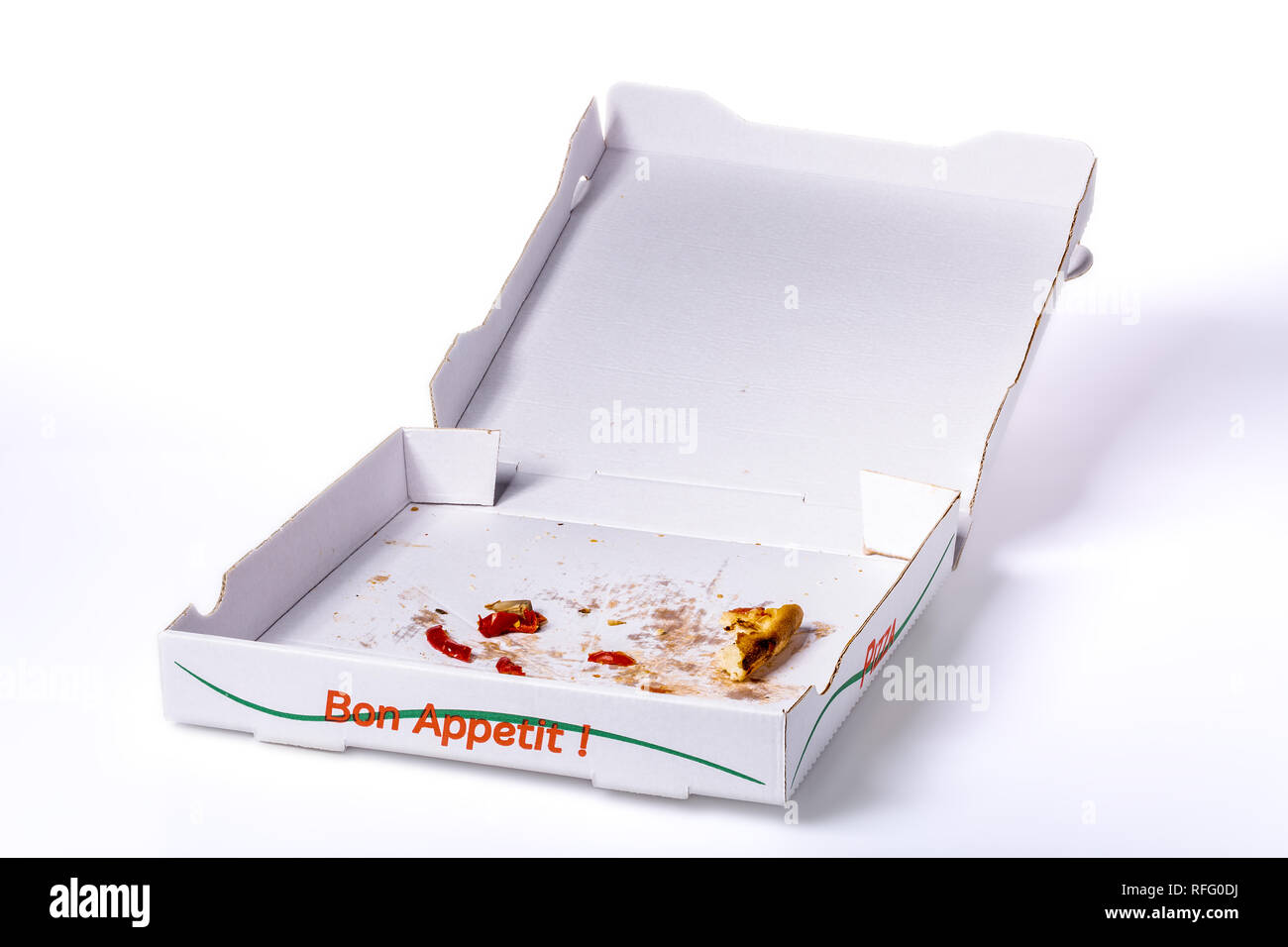 Pizza Box mit einigen Resten auf weißem Hintergrund, clipping path enthalten Stockfoto