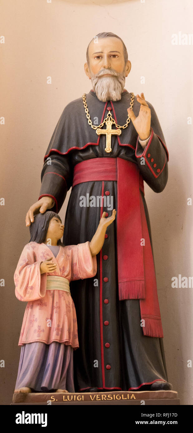 Die Statue des heiligen Luigi Versiglia S.D. B., ein Missionar in China, in der Salesianer von Don Bosco Kirche Santa Maria delle Grazie" - Heilige Maria der Gnade in Pavia Stockfoto