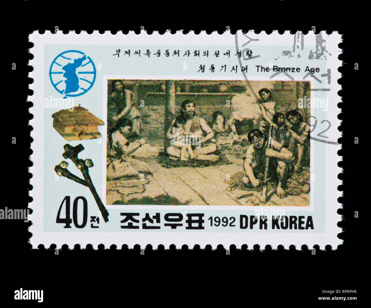 Briefmarke aus Nordkorea, das innen Leben der prähistorischen Menschen. Stockfoto