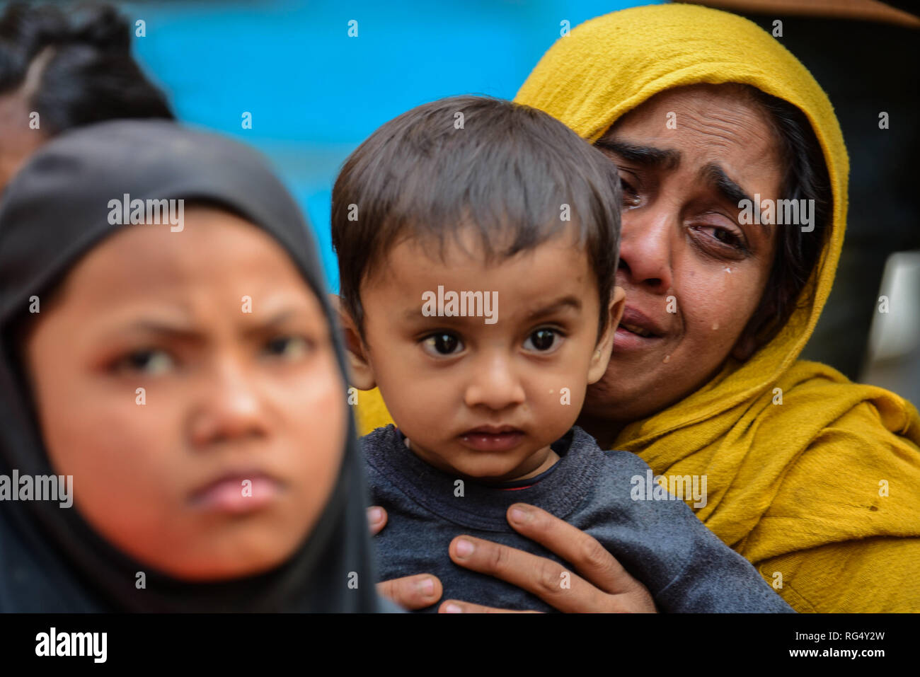 Januar 22, 2019 - Andhra Pradesh, Indien, 22. Januar 2018. 31 Rohingyas, der auf dem India-Bangladesh Grenze für drei Tage gestrandet waren, sind an der Amtali Polizeistation gehalten, nachdem sie von der Indischen Grenze Sicherheit Kraft (BSF) verhaftet wurden und übergab die Tripura Polizei am Dienstag. Die Rohingyas inhaftiert wurden durch die bangladeschischen Grenzschutzbeamten im Niemandsland zwischen der internationalen Grenze von Indien und Bangladesch entlang West Tripura district, denn beide Staaten weigerten sich, sie zu akzeptieren, bis Dienstag Morgen, wenn BSF vereinbart, sie zu verhaften und sie der Polizei übergeben wollten, Beenden einer Distanzhülse mit t Stockfoto