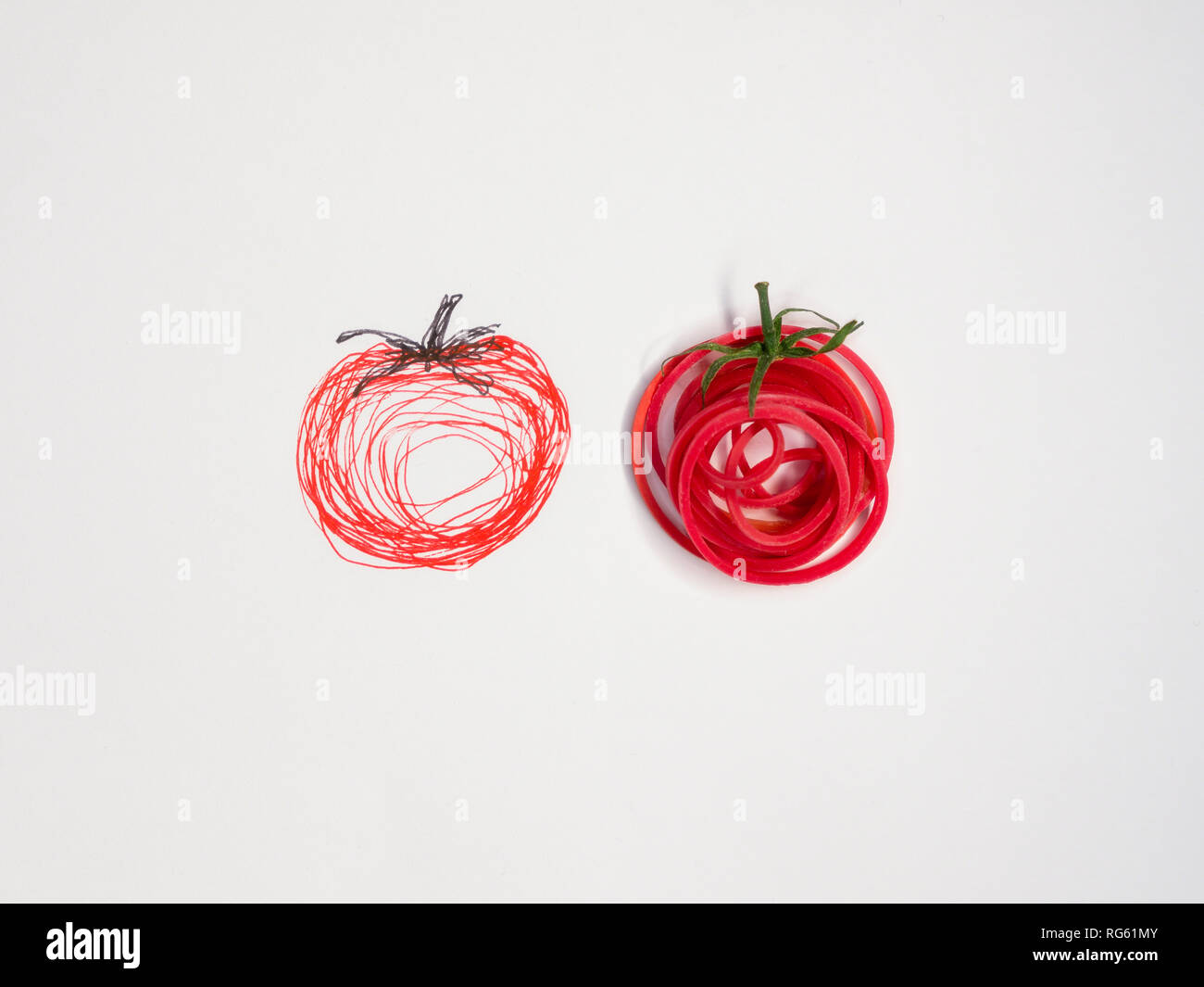 Zwei konzeptionelle Tomaten Stockfoto