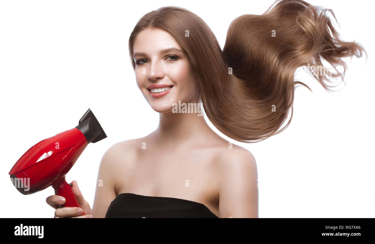 Schöne braunhaarige Mädchen in Bewegung mit einem perfekt glatte Haare, und klassische Make-up. Schönheit Gesicht. Stockfoto