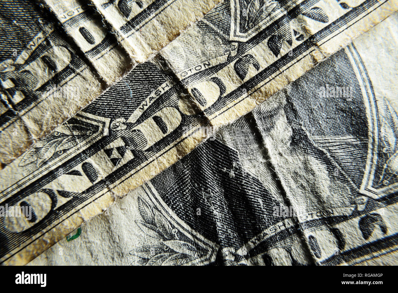 Dollar USA close-up. Alte zerschlagen zerknitterte scheine Makro. Die Textur der Fragment der Dollar Bill. USD banknote Textur. Stockfoto