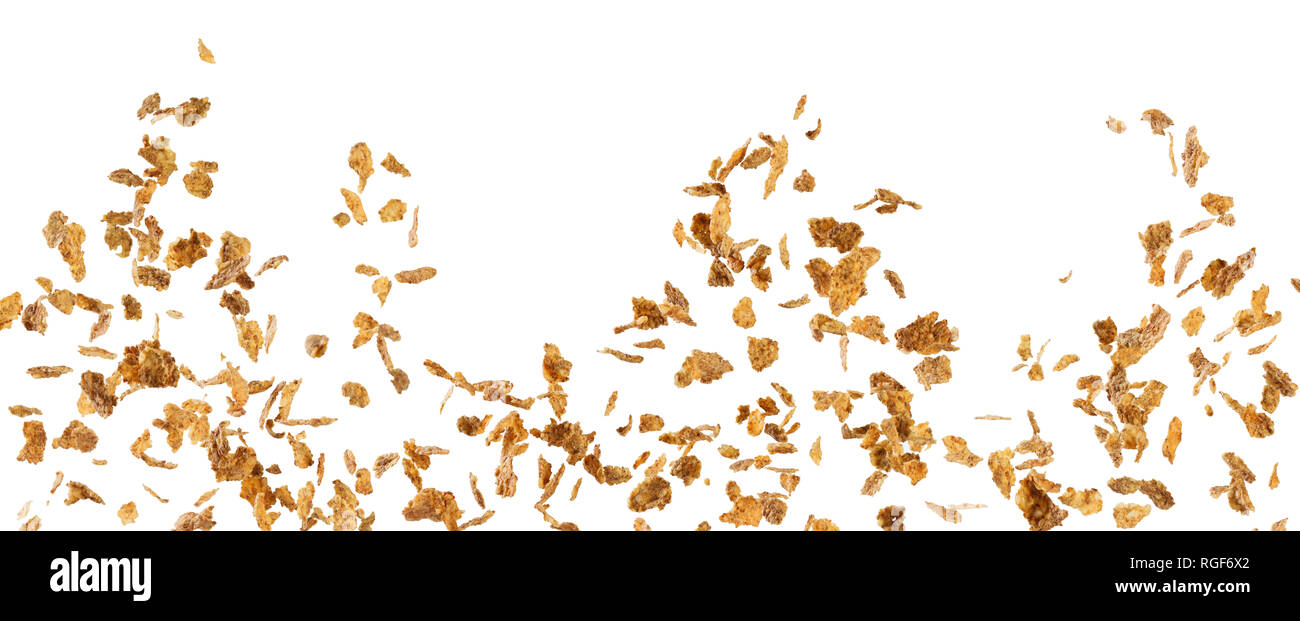 Fallende corn flakes auf weißem Hintergrund Stockfoto