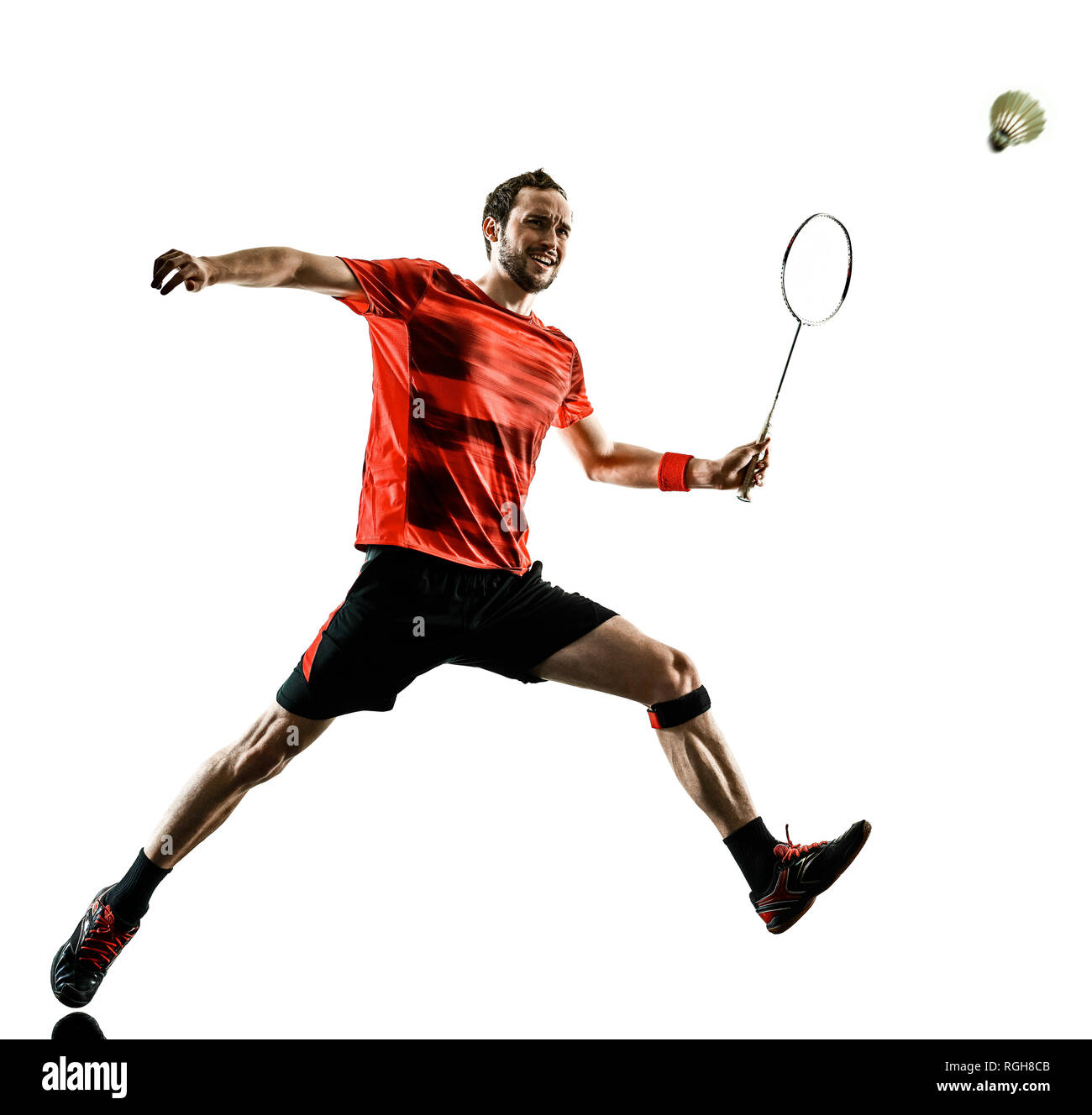 Eine kaukasische Badmintonspieler Mann im Studio Schatten Silhouette auf weißem Hintergrund Stockfoto