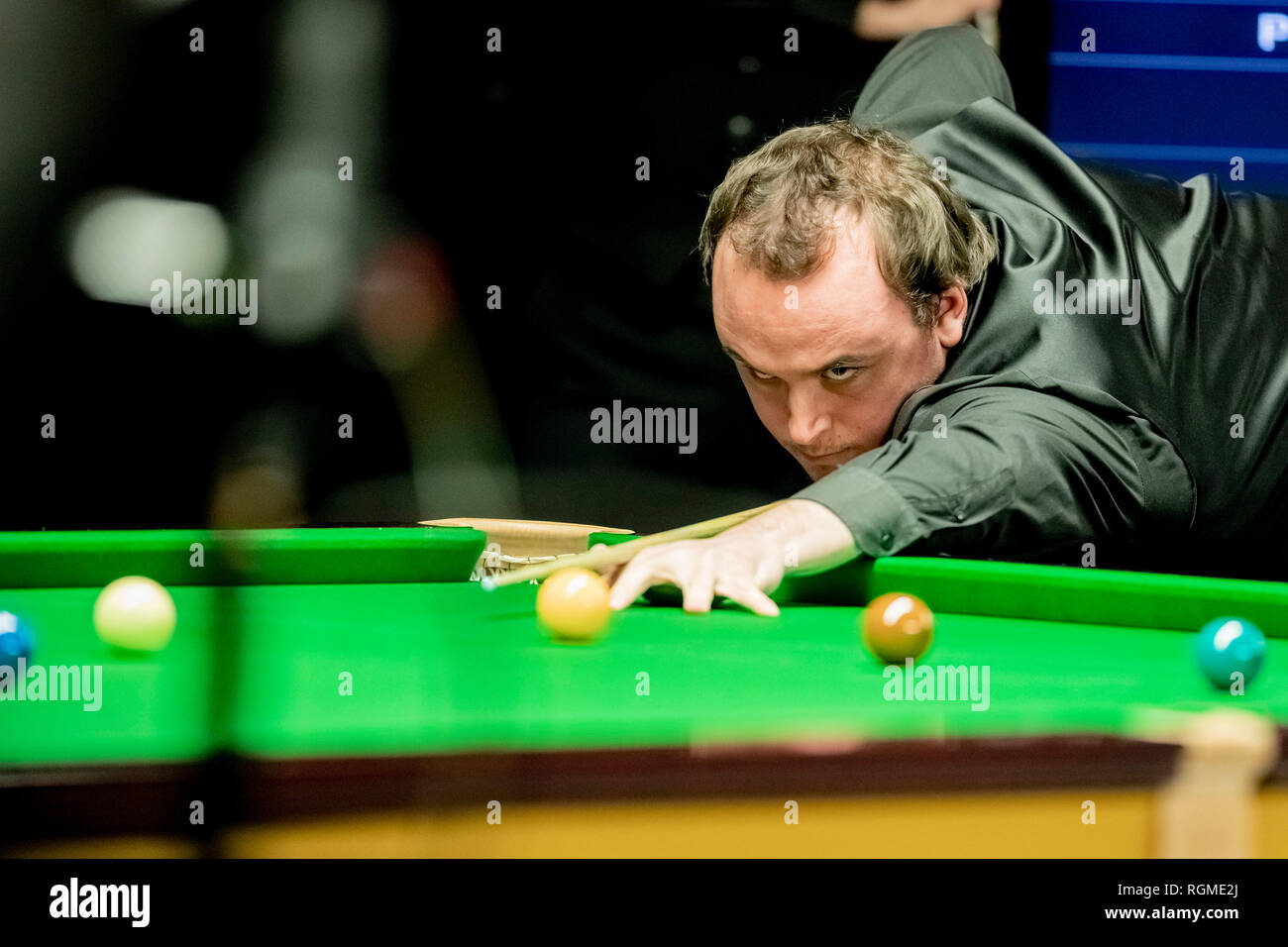 Berlin, Deutschland. 30 Jan, 2019. Sam Baird, snooker Spieler aus England, spielt gegen seinen Landsmann Joe Perry an der German Masters 2019. Credit: Christoph Soeder/dpa/Alamy leben Nachrichten Stockfoto