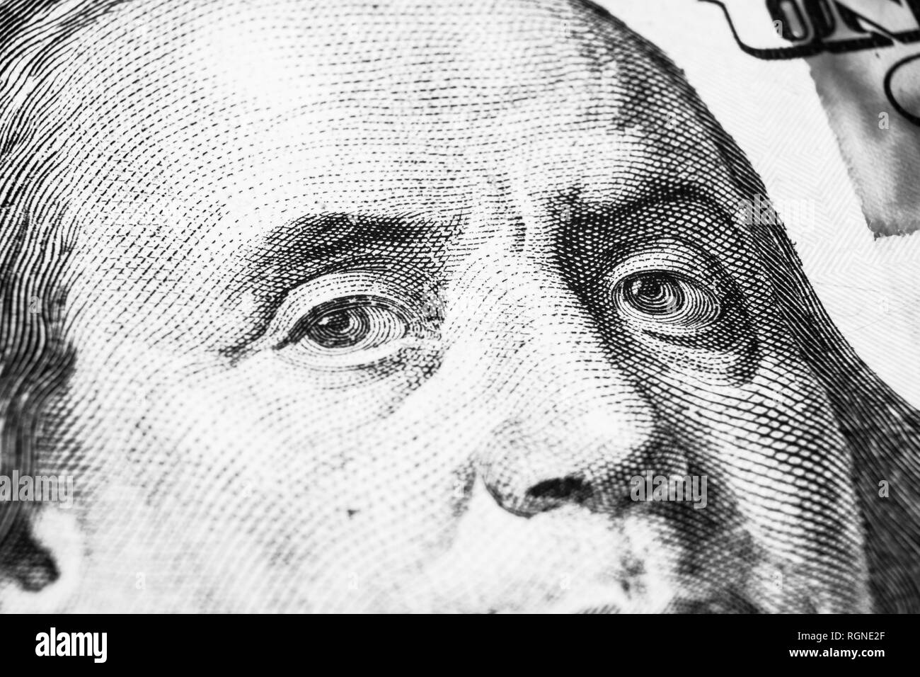 Nahaufnahme Portrait von Benjamin Franklin auf der Hundert Dollar Bill. Hintergrund des Geldes. 100 Dollar Bill mit Benjamin Franklin Augen Makro Stockfoto