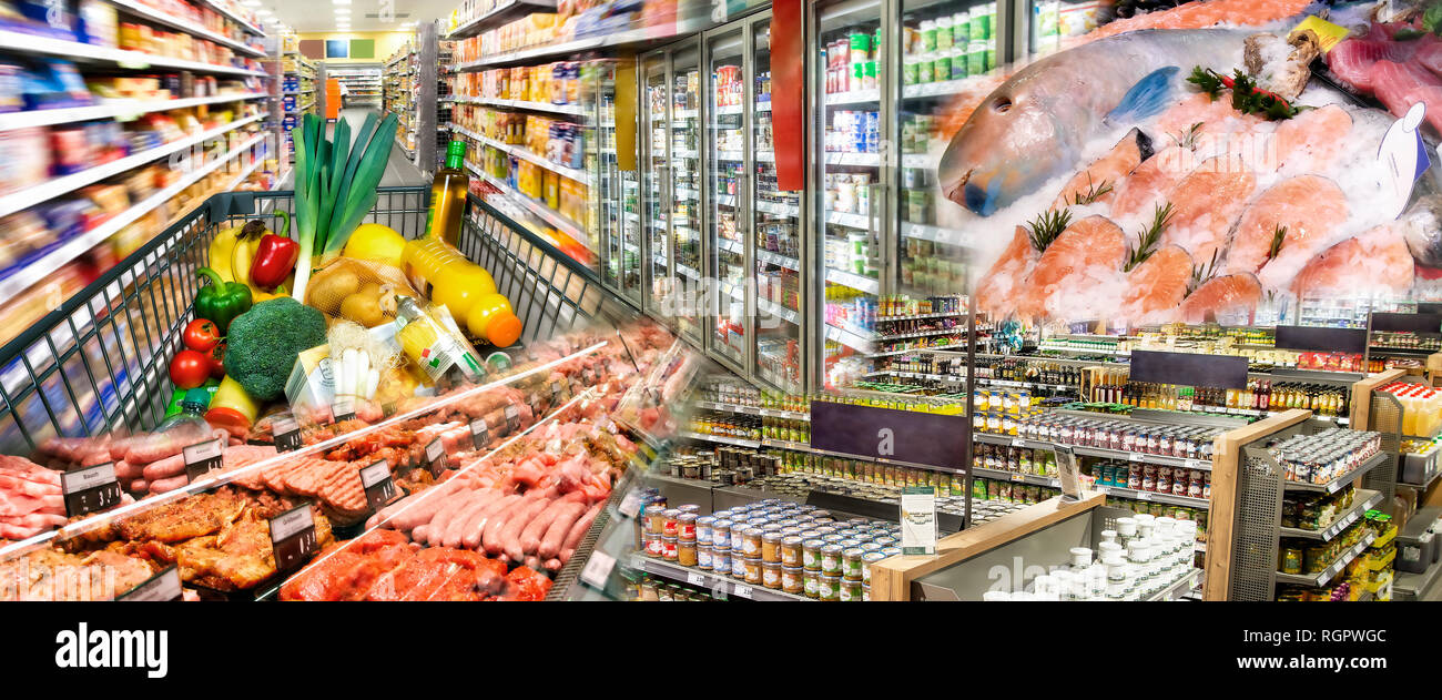 Breite Palette von Waren mit Fleisch und Fisch, Obst und Gemüse im Supermarkt Stockfoto