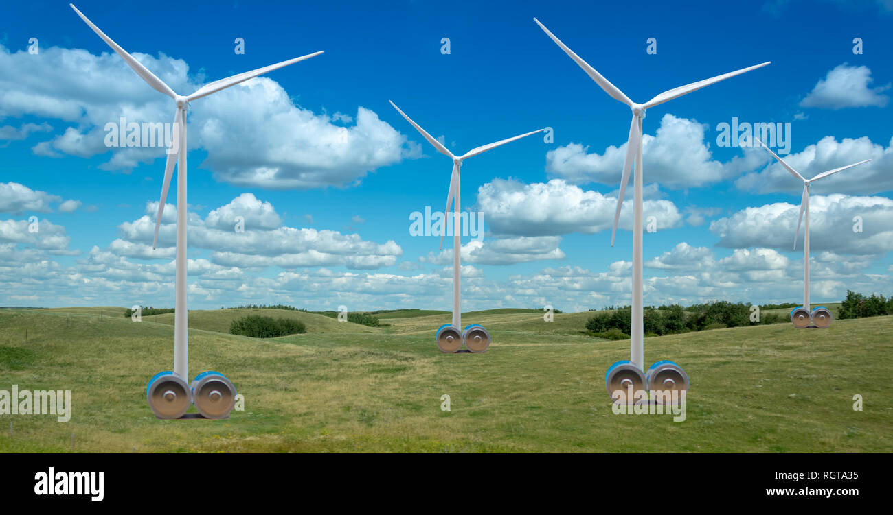 Windenergieanlagen in einer schönen Landschaft mit riesigen Batterien als Symbol Wind Energie zu speichern. Stockfoto