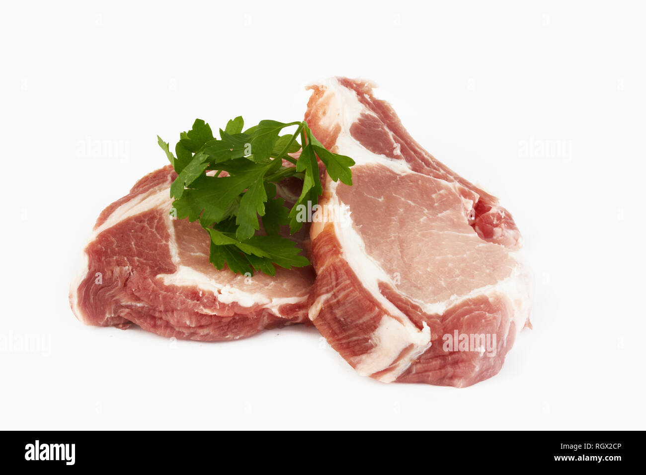 Fleisch rohes Schweinefleisch Schnitzel auf weißem Hintergrund Stockfoto