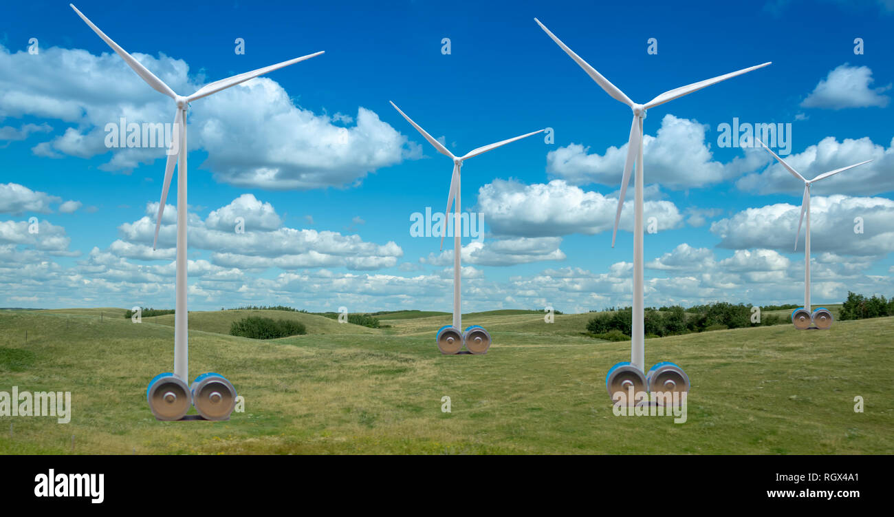 Windenergieanlagen in einer schönen Landschaft mit riesigen Batterien als Symbol Wind Energie zu speichern. Stockfoto