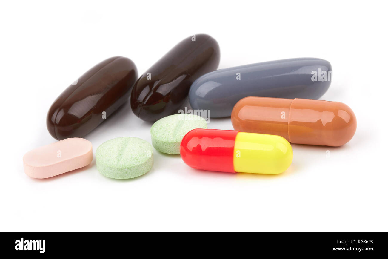 Pillen und Tabletten auf weißem Hintergrund Stockfoto