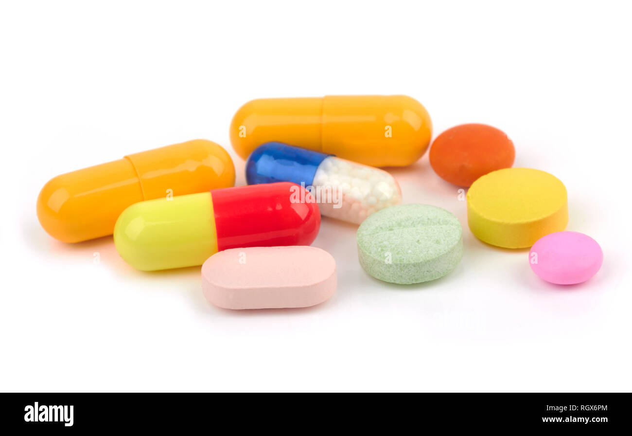Pillen und Tabletten auf weißem Hintergrund Stockfoto