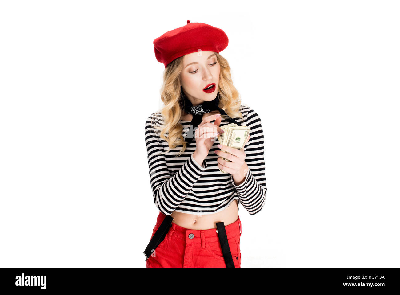 Attraktive Französin zählen Dollar Banknoten isoliert auf weißem Stockfoto