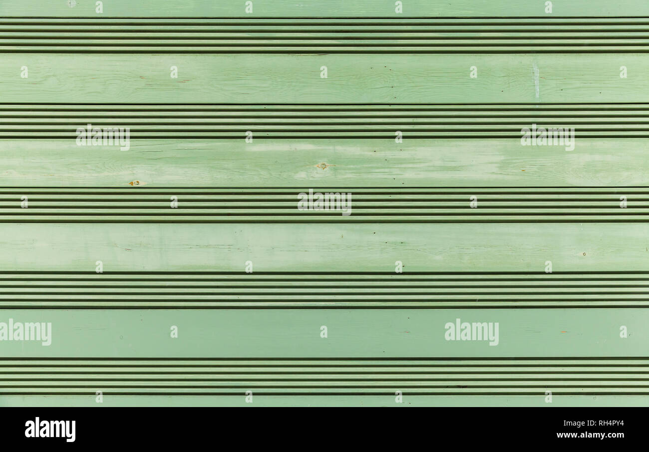 Grün Holzwand, frontale Hintergrund Foto Textur Stockfoto