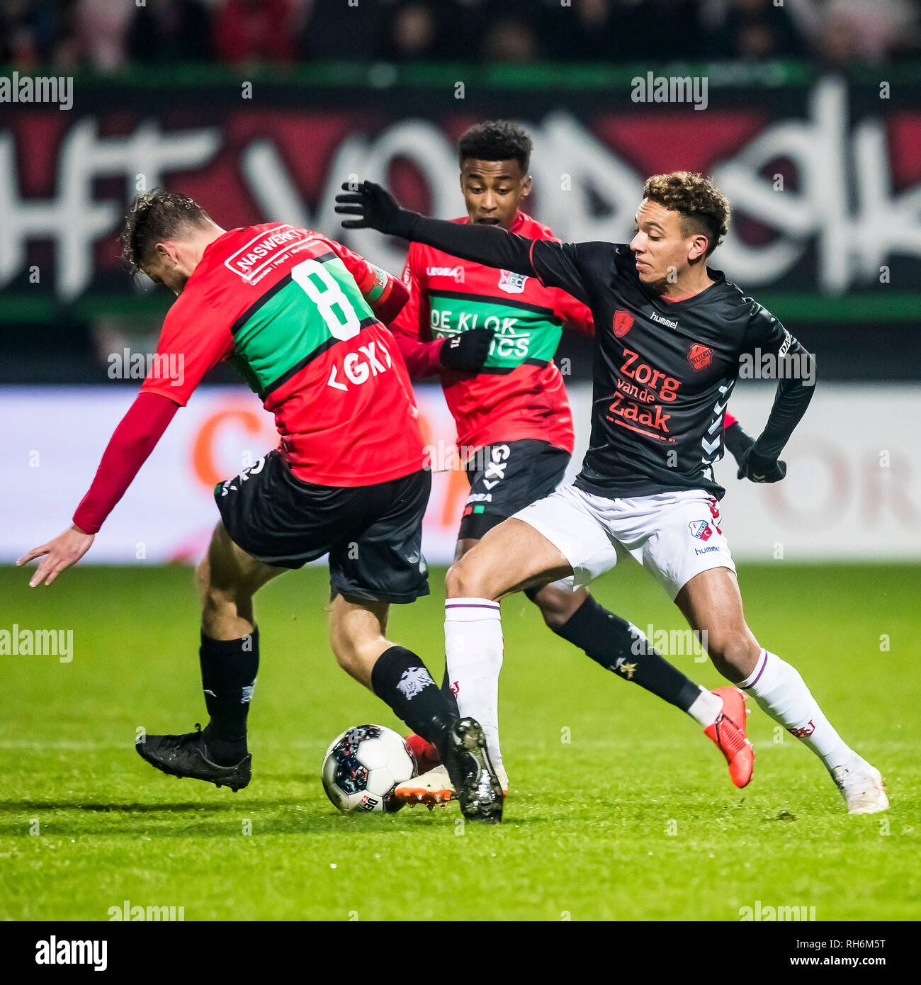 NIJMEGEN, NEC-Jong FC Utrecht, Fußball, Keuken Kampioen Divisie, Saison 2018-2019, 01-02-2019, Goffert Stadium, Jong FC Utrecht player Keelan Lebon (R), NEC Spieler Mike Tresor Ndayishimiye (M), NEC Spieler Joey van den Berg (L) Stockfoto