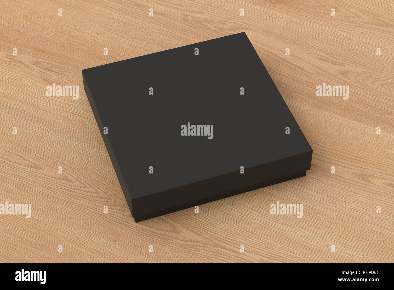 Leere schwarze quadratische flache Geschenkbox, die auf hölzernem Hintergrund nachgeahmt wird. Mit Beschneidungspfad um den Rahmen. Stockfoto